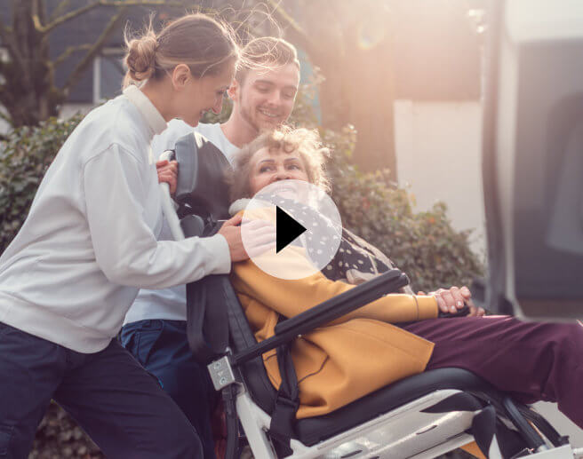 male nurse helping senior