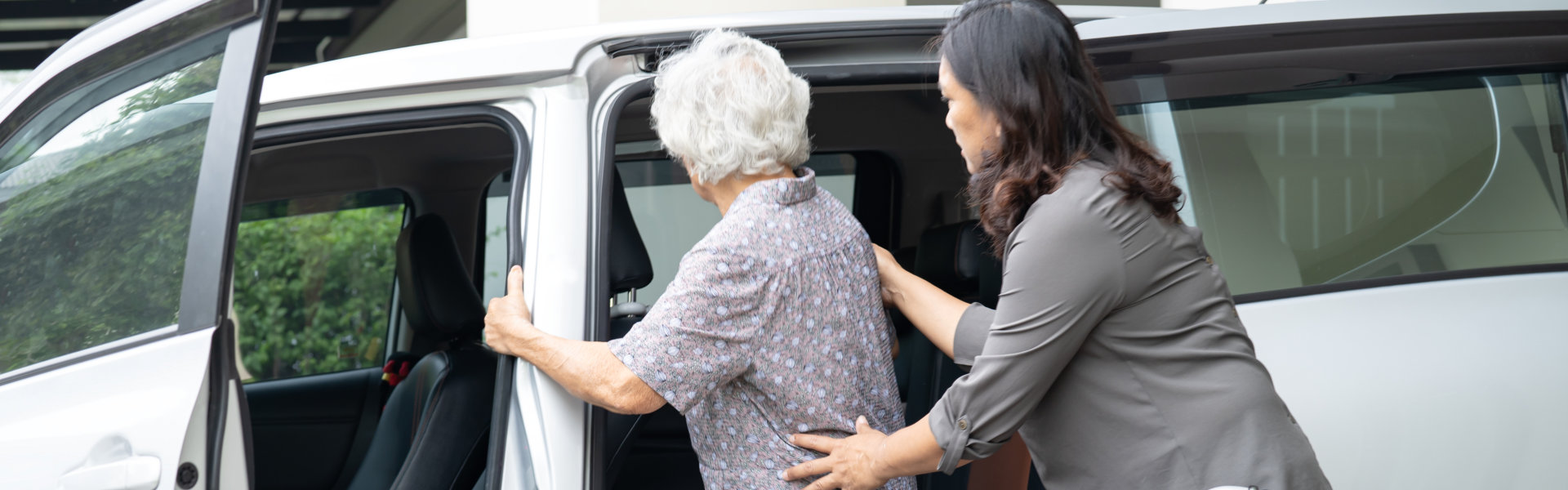 woman helping elder